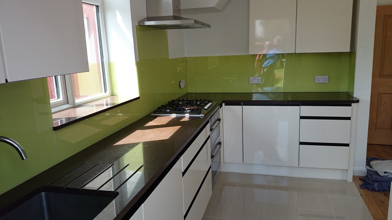 Lime green glass kitchen splashback installed by Ruislip glaziers