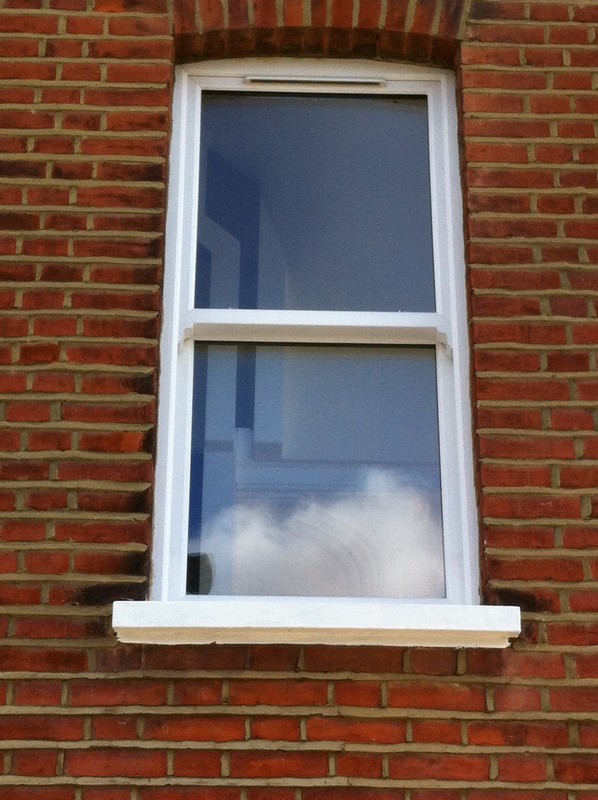 uPVC sash window on Victorian red brick house in Ruislip